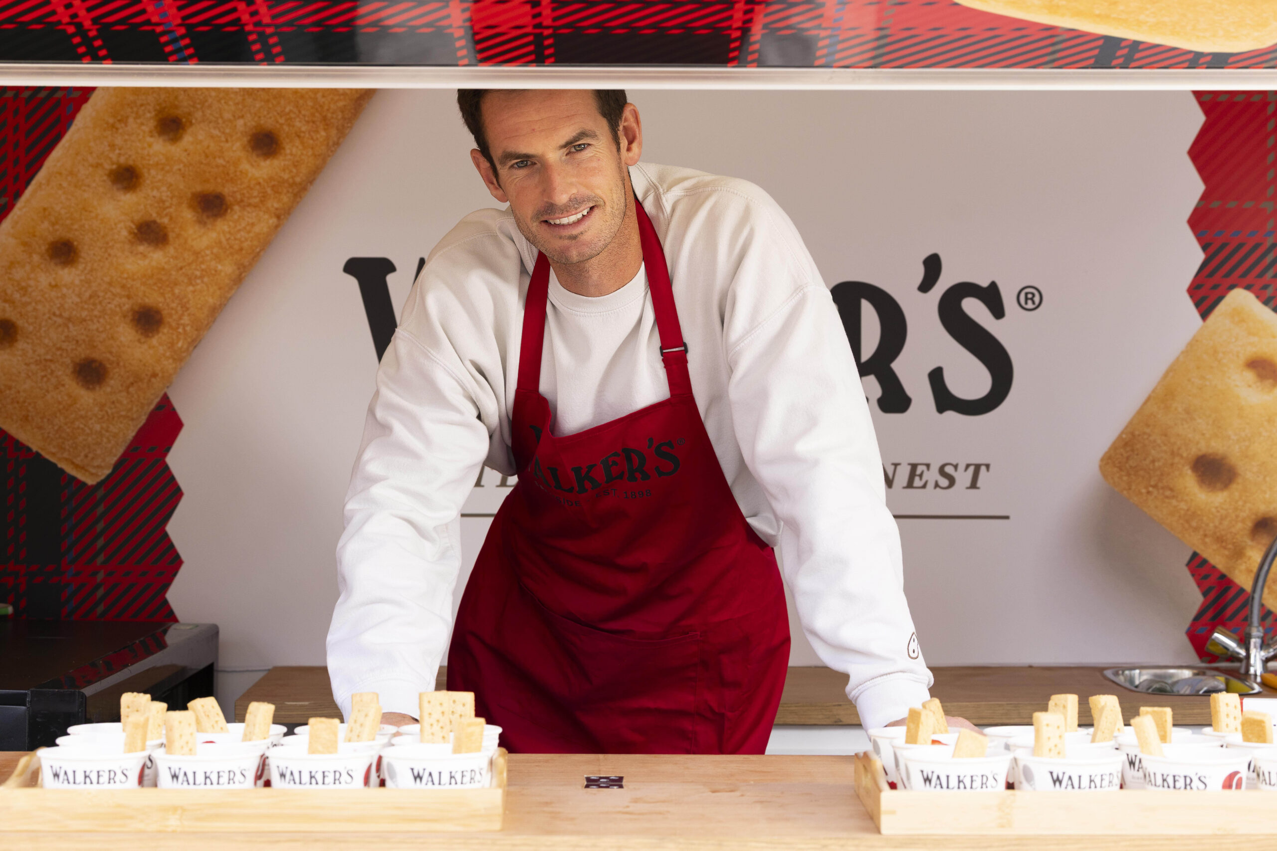 Sir Andy Murray Serves Strawberries And Cream With Finger Of Walker's Shortbread In Wimbledon, London, Uk 03 July 2025